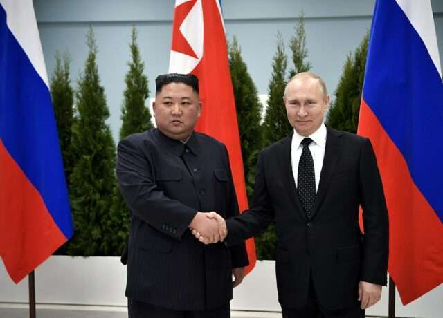 Vladimir Putin and Kim Jong-un